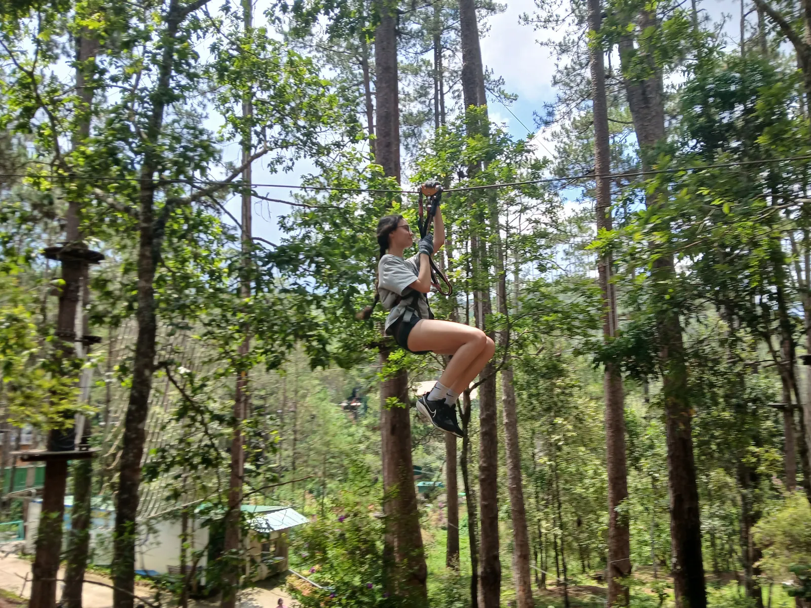 A student on the zip line at the Đà Lạt adventure park