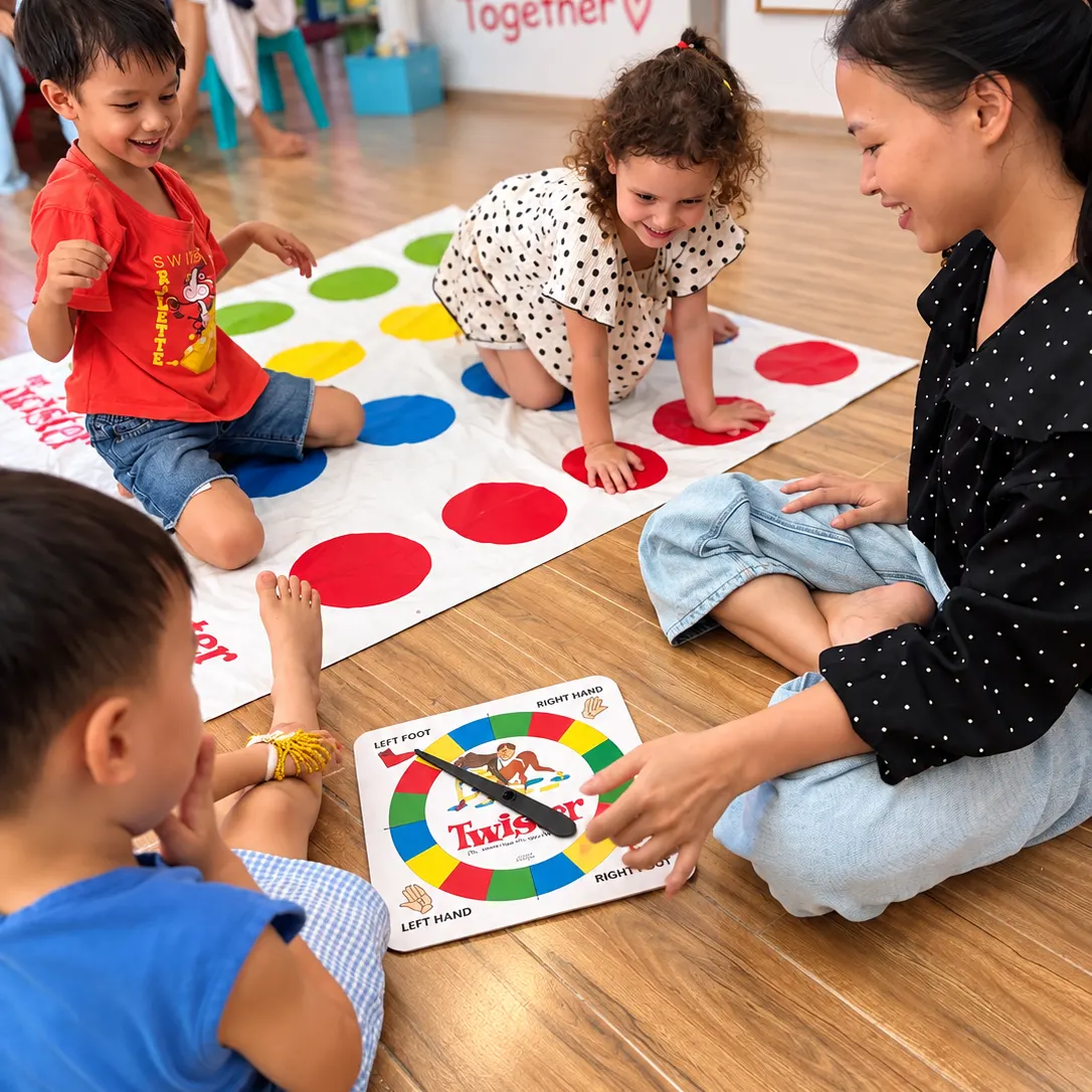 A teacher playing Twister with Early Years children