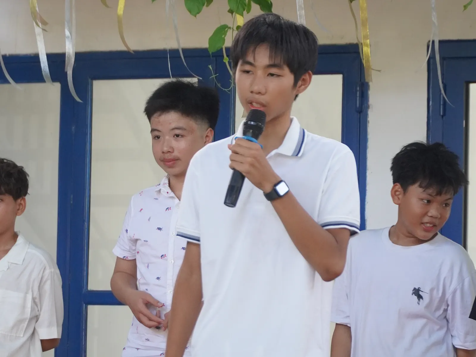 A student giving a speech at graduation