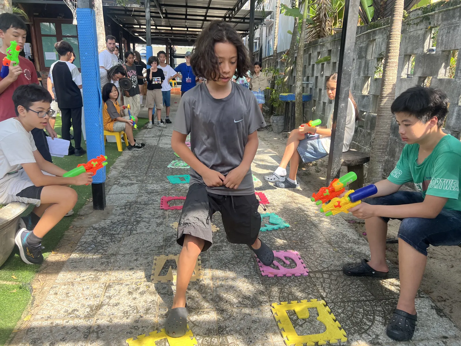 Students playing a water game on Learning Without Walls