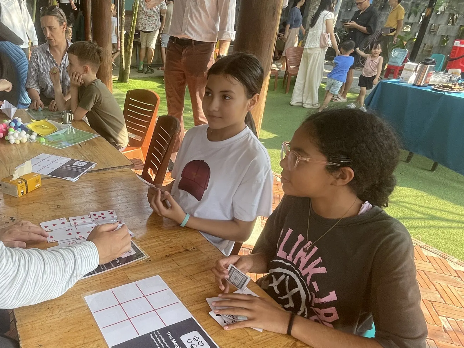 Students solving a magic square puzzle at March Mathness