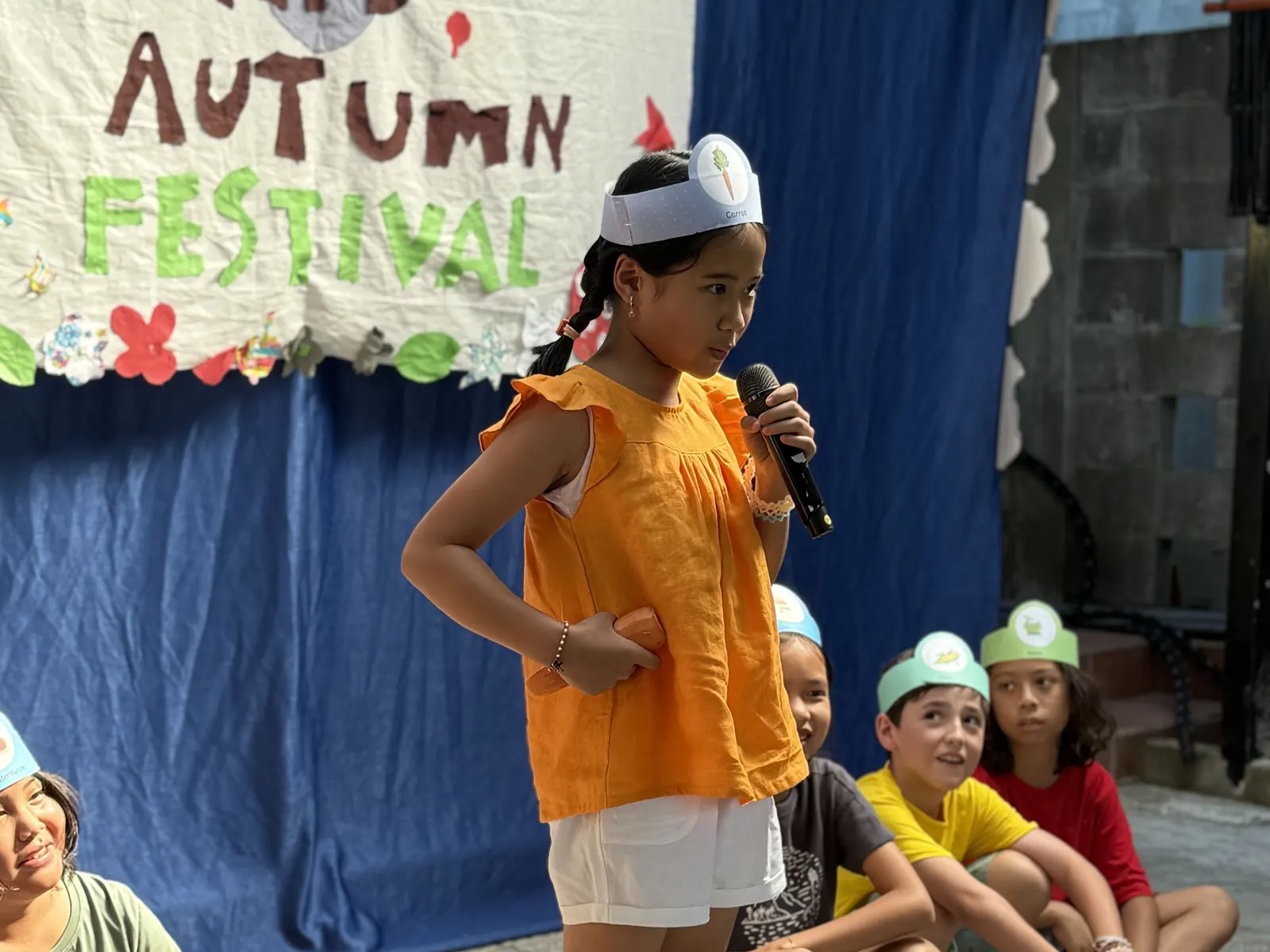 A student hosting the Mid-Autumn Festival show