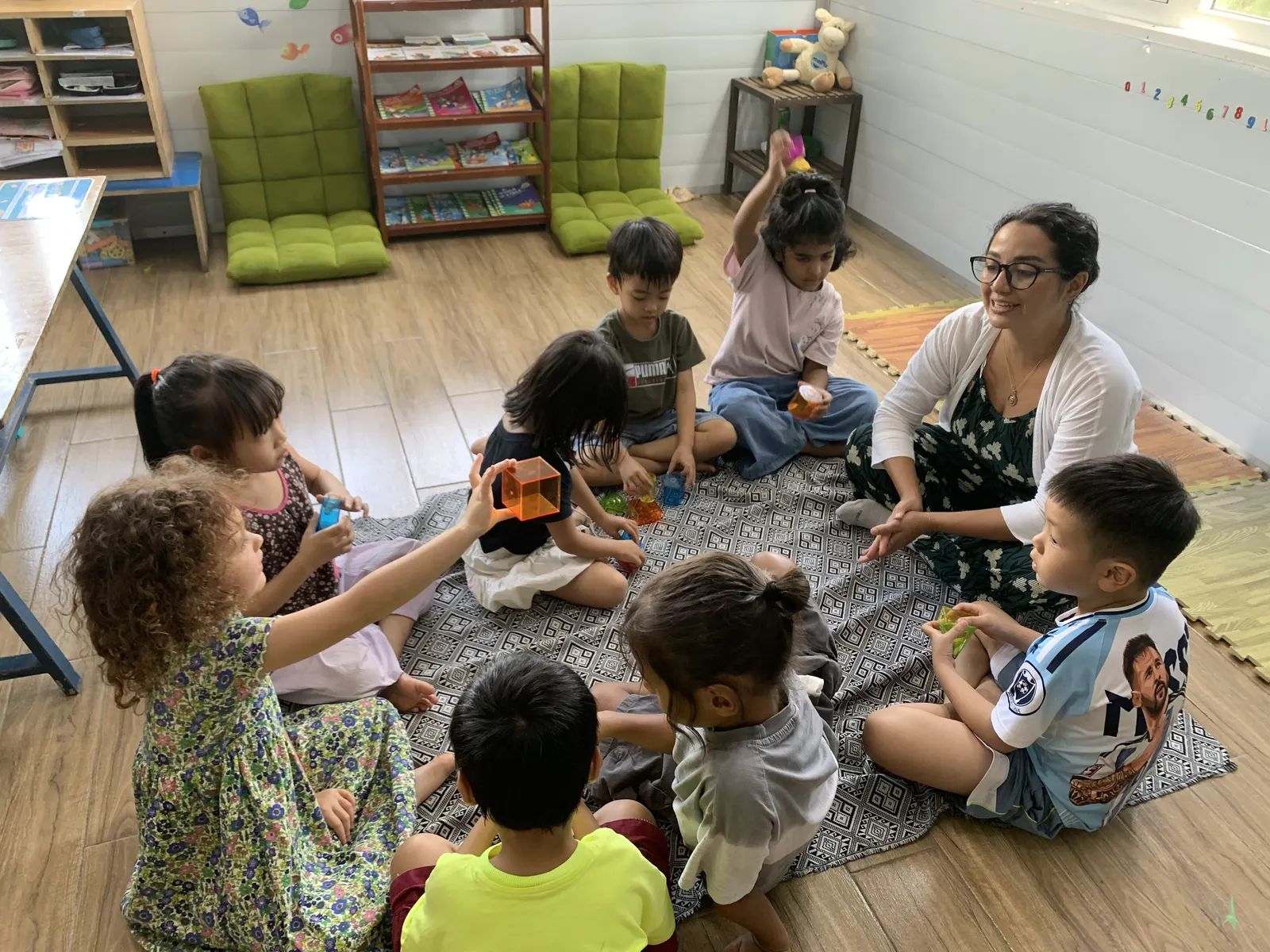 Ms. Solo at circle time with her Primary class