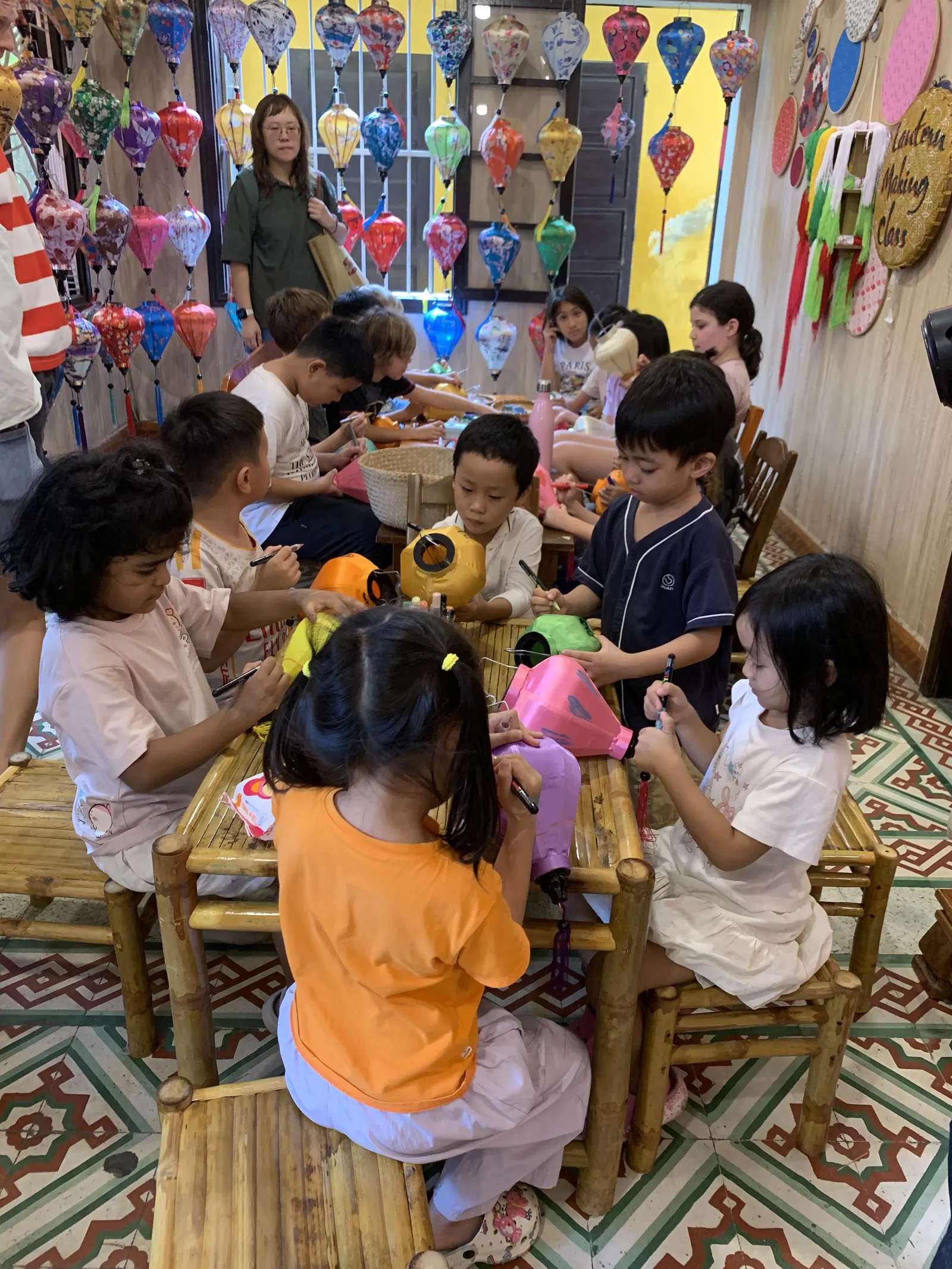 Ms. Kiu's Primary class at a lantern-making workshop in Hội An