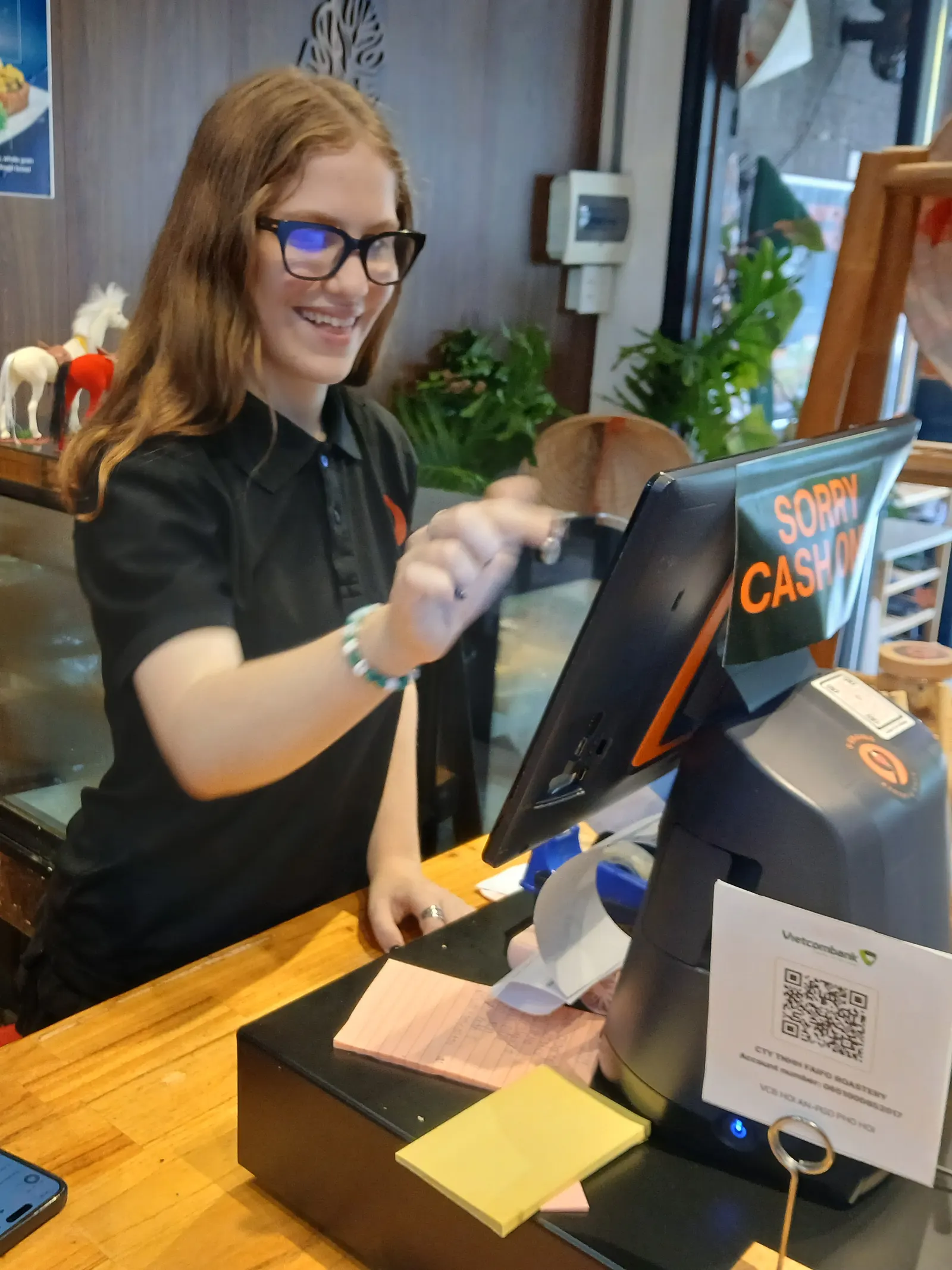 Working the counter alongside the staff on an internship